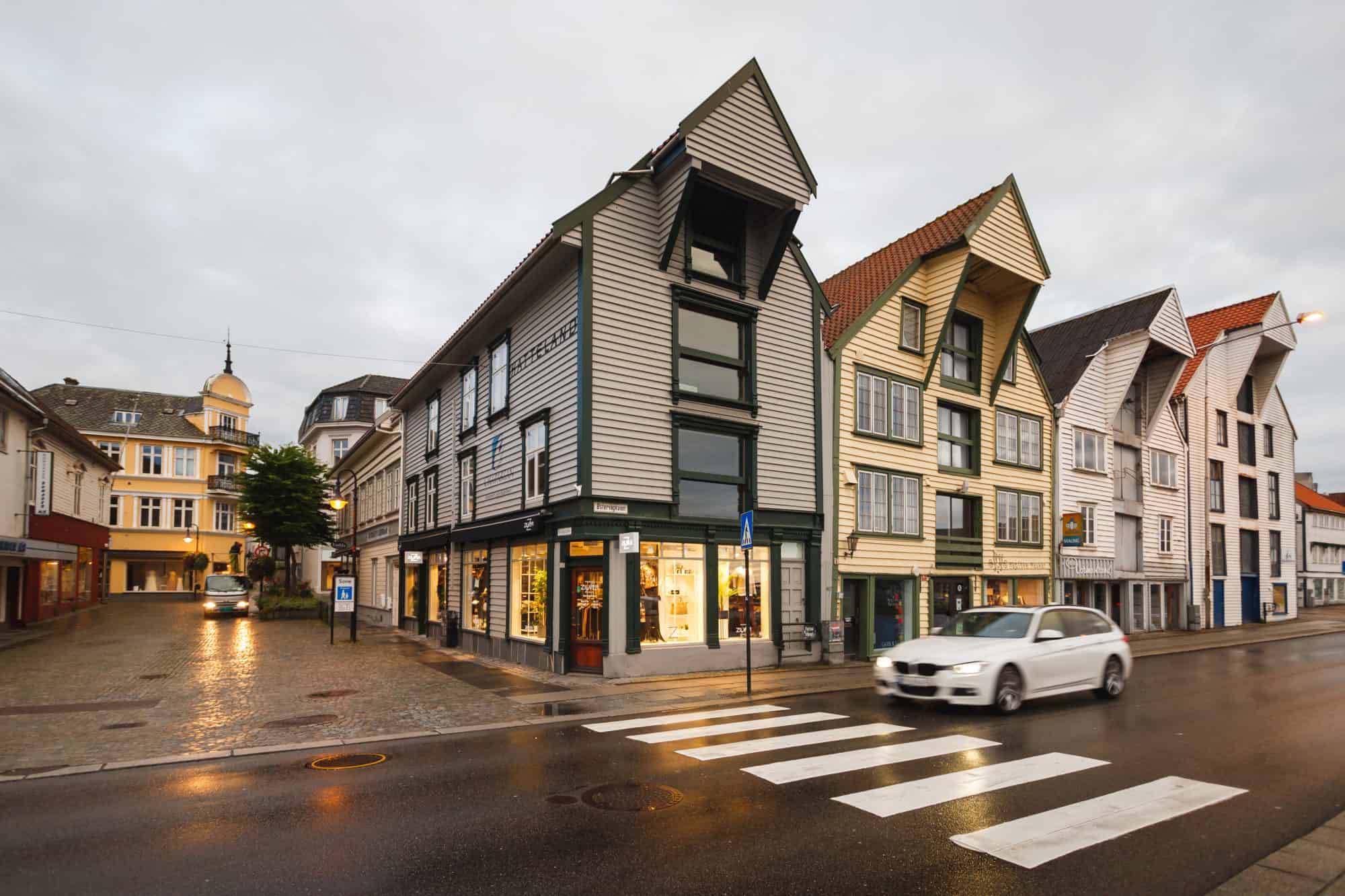 Stavanger, Norway - August 25 2017: The wooden facade of old buildings of Stavanger in rainy weather